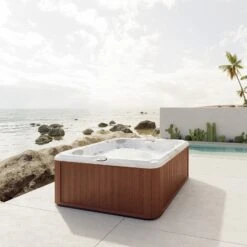 Jacuzzi® J235™ / J235IP™ - 6 Person Hot Tub With 1 Lounger -Hot Tubs Sale JHT J235 Lifestyle RoastedChestnut Isosquare